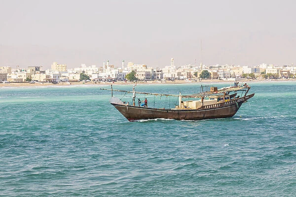 Middle East, Arabian Peninsula, Al Batinah South. Traditional dhow in the harbor at Sur