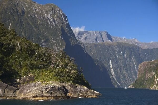Milford Sound, New Zealand. An afternoon cruise through Milford sound is a popular activity