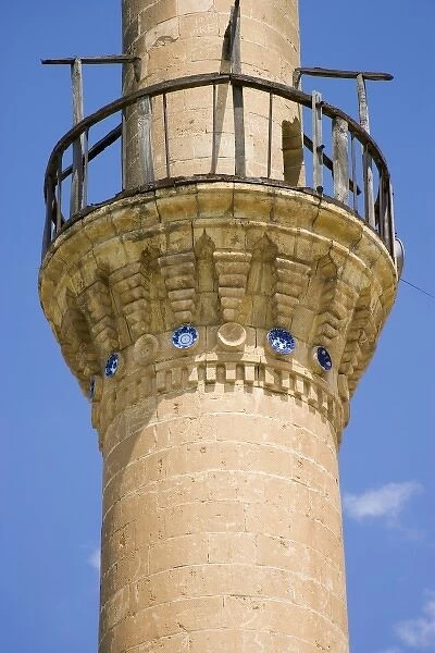 Minaret of Halfeti Merkez Camii partly flooded by the lake of Birecik Dam on the Euphrates river