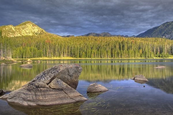 Minneopa Lake catches dramatic morning light in the Pioneer Mountains near Dillon Montana