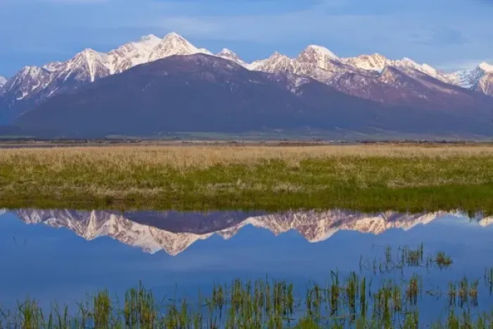 Framed Print : Mission Mountains cast a perfect refection in small pond at the Ninepipe WMA in Framed Print : Mission Mountains cast a perfect refection in small pond at the Ninepipe WMA in