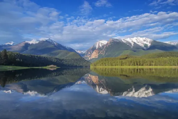 Framed Print : Mission Reservoir reflecting peaks of the Mission Mountains near St Ignatius, Montana Framed Print : Mission Reservoir reflecting peaks of the Mission Mountains near St Ignatius, Montana