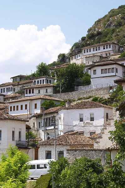 The modern lower part of the village crawling up the hillside with white washed ottoman