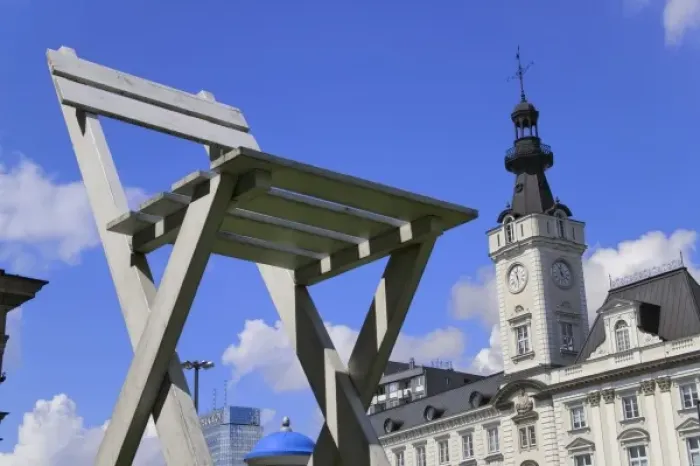 Framed Print : Modern sculpture with historical building, Warsaw, Poland
