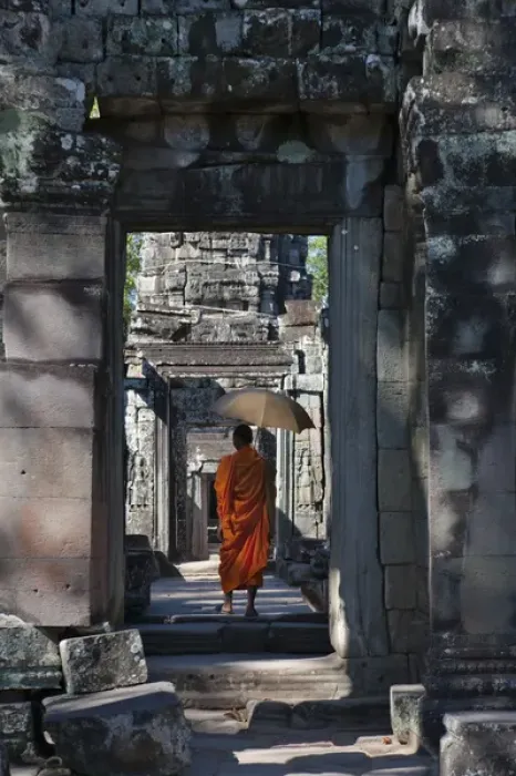 Framed Print : Monk with Buddhist statues in Banteay Kdei, UNESCO World Heritage site