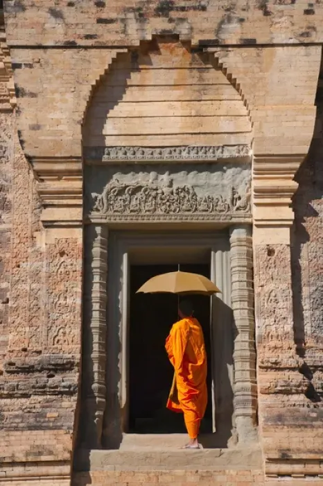 Framed Print : Monk in Prasat Kravan with brick structure, Angkor Wat, UNESCO World Heritage site