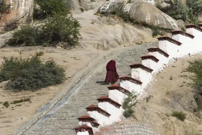Framed Print : Monk walking the stairs in Drepung Monastery, one of the great three Gelug university Framed Print : Monk walking the stairs in Drepung Monastery, one of the great three Gelug university