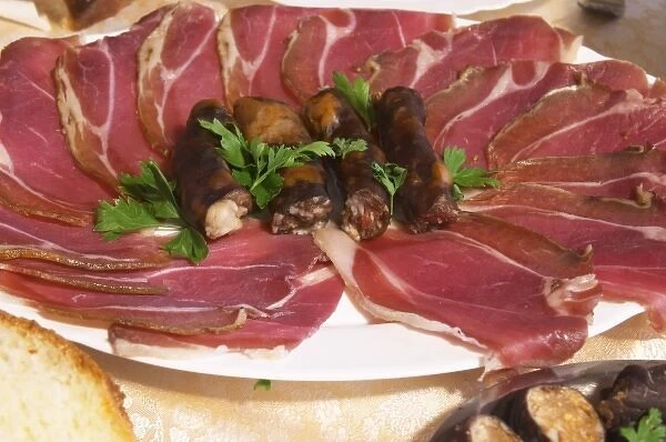 Montenegrin food speciality: Smoked and cured ham and smoked sausages. Durovic Jovo Winery