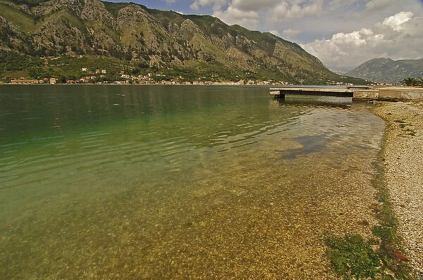 Montenegro, Kotor, transparent green water of the Adriatic sea at the foot of a fjord s