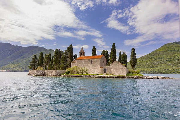 Montenegro, Kotor. View of church on island in bay