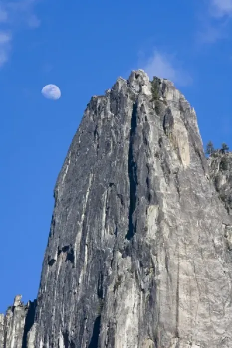 Framed Print : The moon rises and shines through the clouds above Cathedral Rock - Yosemite National Park Framed Print : The moon rises and shines through the clouds above Cathedral Rock - Yosemite National Park