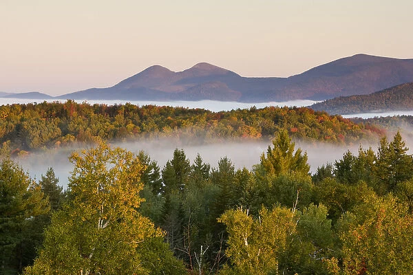 Morning fog and the Percy Peaks as seen from the fire tower at Milan Hill State Park in Milan