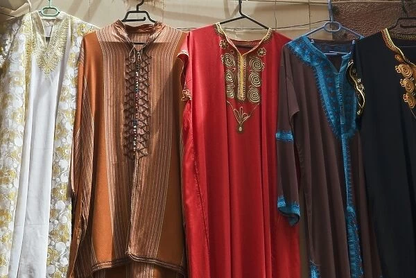 Moroccan clothes for sale, Souk, Medina, Marrakech (Marrakesh), Morocco, North Africa