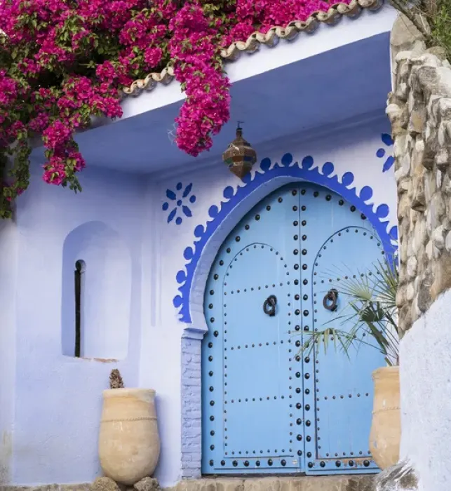 Framed Print : Morocco, Chefchaouen. Bougainvillea blossoms frame an ornate blue door Framed Print : Morocco, Chefchaouen. Bougainvillea blossoms frame an ornate blue door