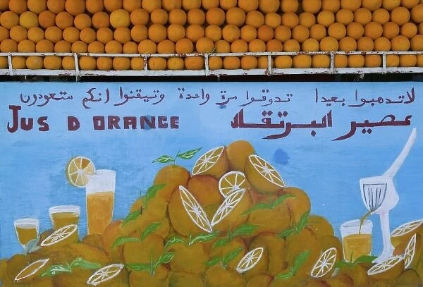 MOROCCO, Souss Valley, TAROUDANT: Orange Juice Vendor Sign Municipal Souk  /  Market