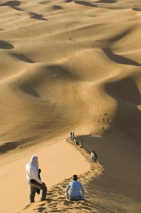 Framed Print : MOROCCO-Tafilalt-MERZOUGA: Erg Chebbi Dunes (up to 400 ft in height) and visitors (NR) Framed Print : MOROCCO-Tafilalt-MERZOUGA: Erg Chebbi Dunes (up to 400 ft in height) and visitors (NR)