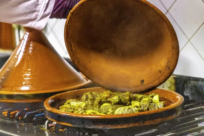 Framed Print : Morocco, Taroudant Province. Hotel Dar Zitoune, cooking food in a tagine