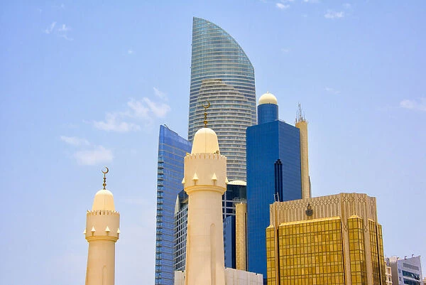 Mosque with modern high-rises in downtown, Abu Dhabi, United Arab Emirates