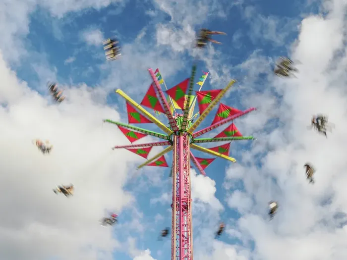 Framed Print : Motion blur of Swing (or Chair Swing) ride at a fair