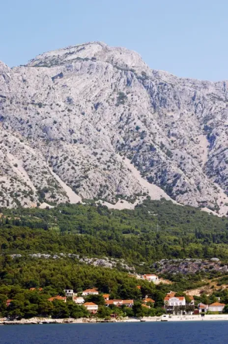 Framed Print : Mountain top of the Mount Sveti Ilija, with white rock formations. At sea level the Orebic village