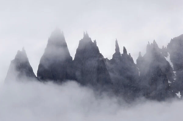 Mountain peaks in fog Prins Christian Sund Greenland