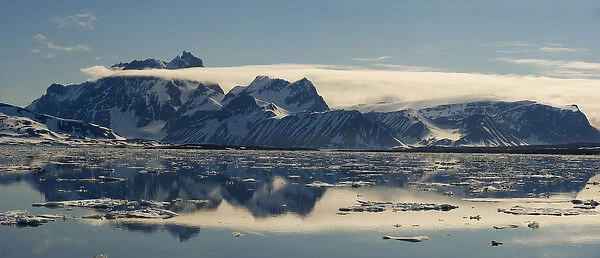Mountain Range and clouds with Icebergs, Hornsund Fiord, on the western side of the
