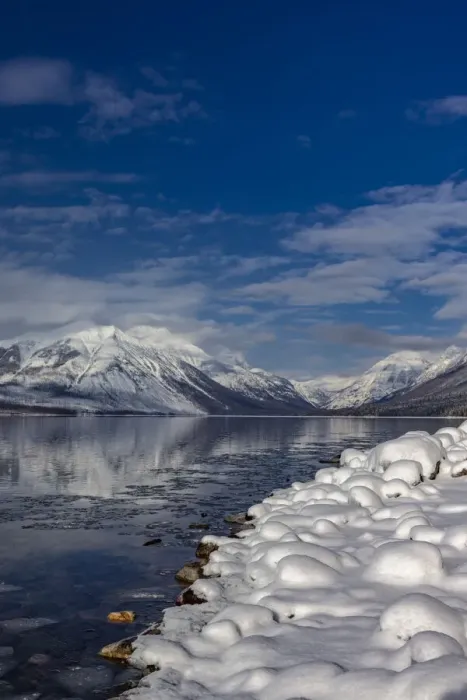Framed Print : Mountains reflect in wintry Lake McDonald in Glacier National Park, Montana, USA Framed Print : Mountains reflect in wintry Lake McDonald in Glacier National Park, Montana, USA