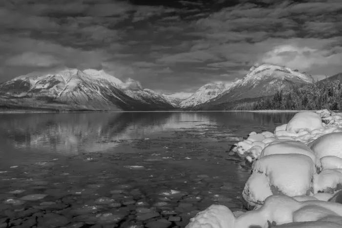 Framed Print : Mountains reflect in wintry Lake McDonald in Glacier National Park, Montana, USA Framed Print : Mountains reflect in wintry Lake McDonald in Glacier National Park, Montana, USA