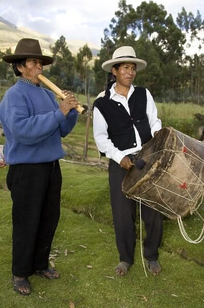 Musicians play in field during feast celebration, Vicos, Peru, South America MR