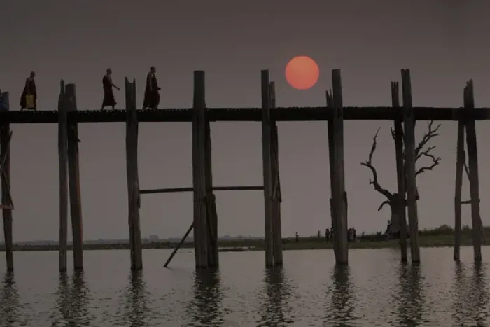 Framed Print : Myanmar, Amarapura. Buddhist monks crossing U Bein Bridge at sunset Framed Print : Myanmar, Amarapura. Buddhist monks crossing U Bein Bridge at sunset