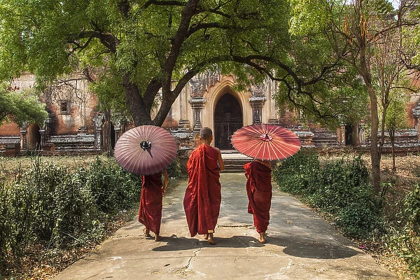Myanmar, Bagan. Novice monks in front of temple