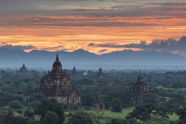 Myanmar, Bagan. Sunrise over stupas on the plains of Bagan