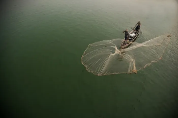 Framed Print : Myanmar, Mandalay, Amarapura. Fisherman casting net on Irrawaddy River. Credit as
