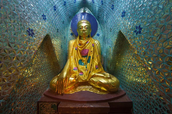 Myanmar, Yangon. Buddha statue in Schwedagon Temple