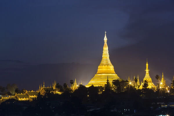 Myanmar, Yangon. Schwedagon Pagoda glows at twilight