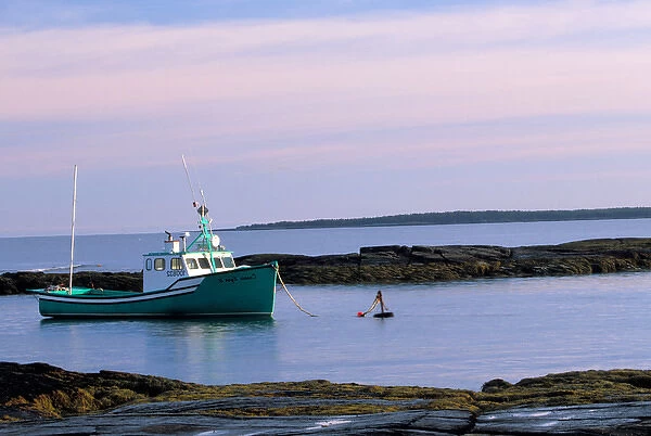 N. A. Canada, Nova Scotia, Blue Rocks. Lobster boat in quiet bay early morning