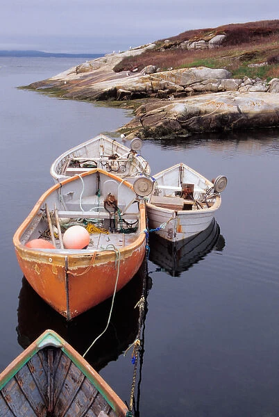 N. A. Canada, Nova Scotia, Peggys Cove. Dinghys tied up in harbor