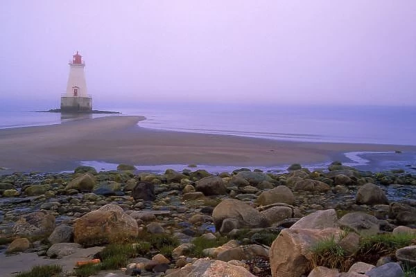 N. A. Canada, Nova Scotia, Shelburne County. Sandy Point lighthouse on a foggy morning