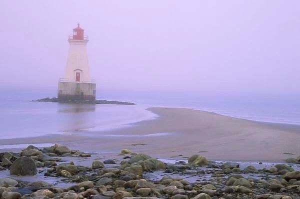 N. A. Canada, Nova Scotia, Shelburne County. Sandy Point lighthouse on a foggy morning