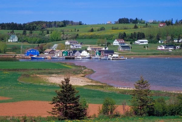 N. A. Canada, Prince Edward Island. Boats are docked at a small town next to the French