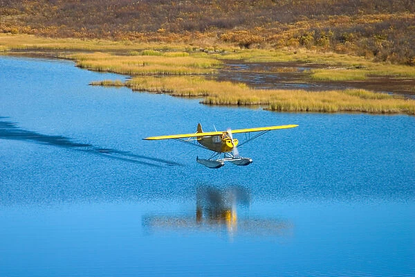 N. A. USA, Alaska. Float plane on lake along the Denali Highway