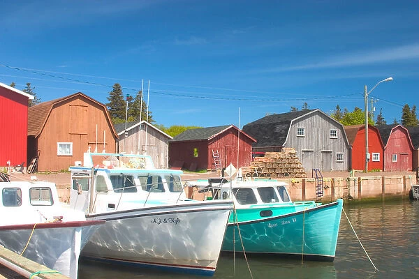 NA, Canada, Prince Edward Island, Malpeque Harbour. Fish sheds and lobster boats
