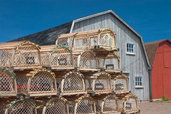 NA, Canada, Prince Edward Island, Malpeque Harbour. Lobster pots and fish sheds