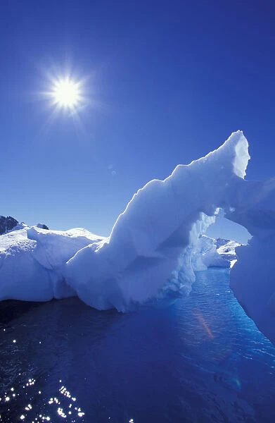 NA, USA, Alaska, Antarctic Peninsula, Paradise Bay. A large iceberg sits grounded