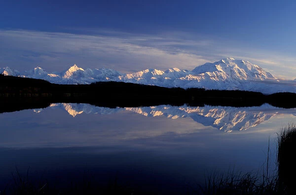 NA, USA, Alaska, Denali NP, Mt. McKinley reflected in tundra pond at sunset