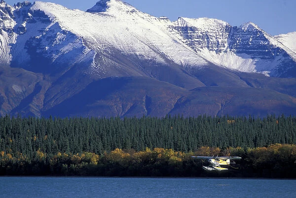NA, USA, Alaska, Katmai NP, Naknek Lake A Piper Super Cub takes off from Naknek Lake; Mt