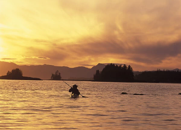 NA, USA, Alaska, Ketchikan. Solo kayaker enjoys sunset (Medium Format)