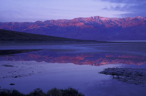 NA, USA, California. Death Valley National Park. Panamint Range at sunrise from Badwater
