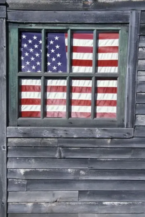 Framed Print : NA, USA, Maine, Georgetown Island. Flag of the United States in window of abandoned store