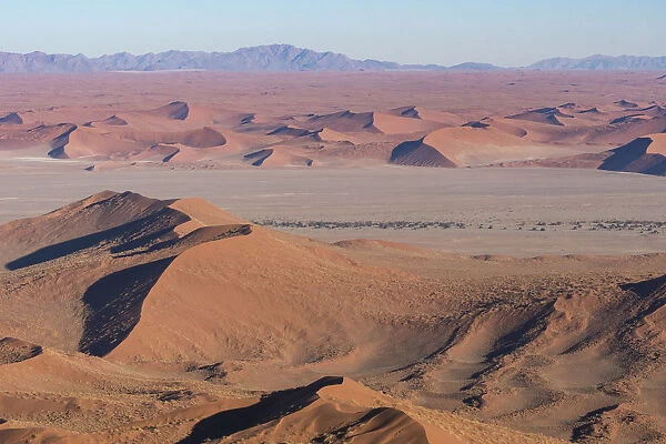 Namibia. Aerial view of the vast red dune fields of Sossusvlei in Namib-Naukluft
